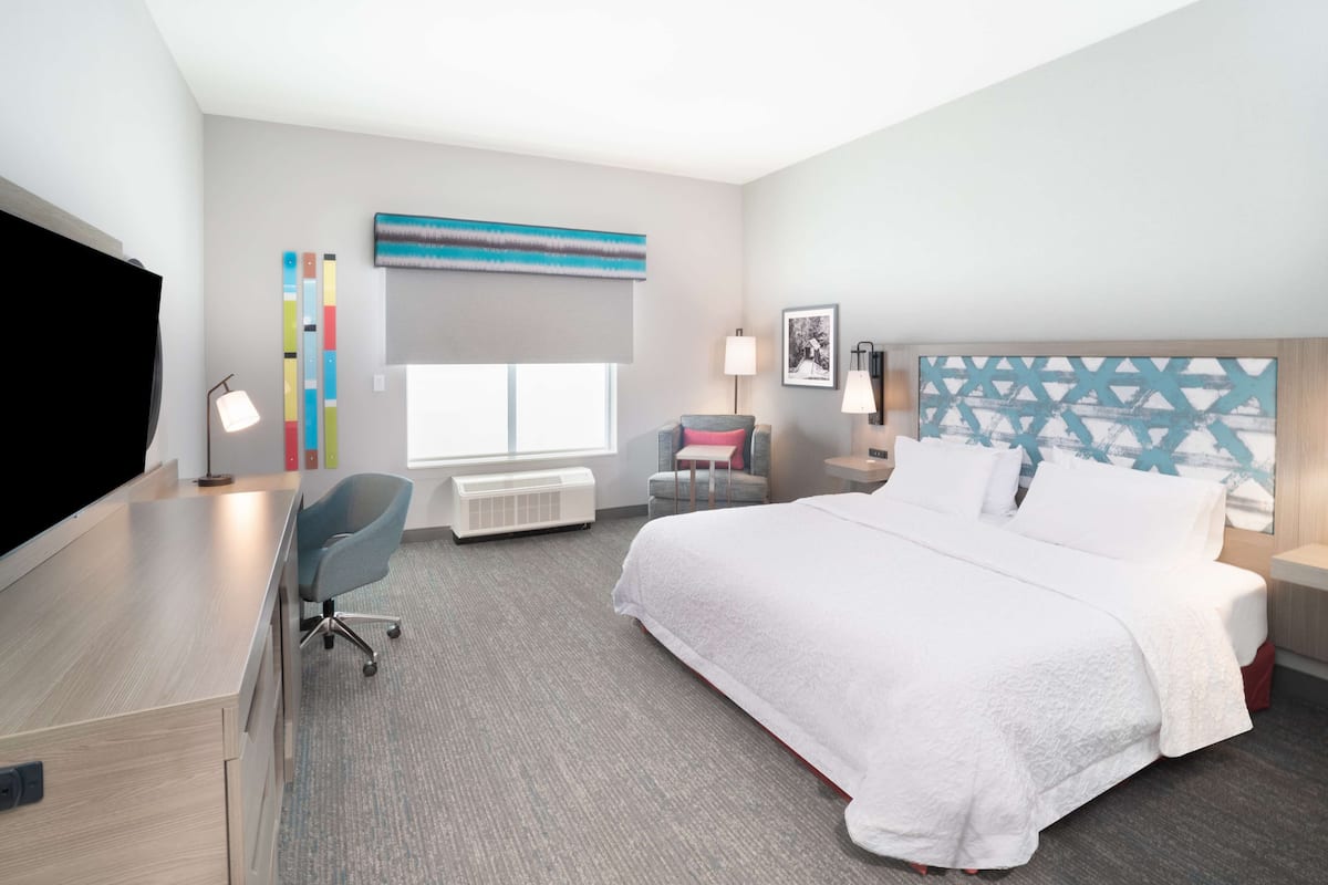 room, 1 king bed, accessible (mobility & hearing, roll-in shower) | in-room safe, iron/ironing board, bed sheets