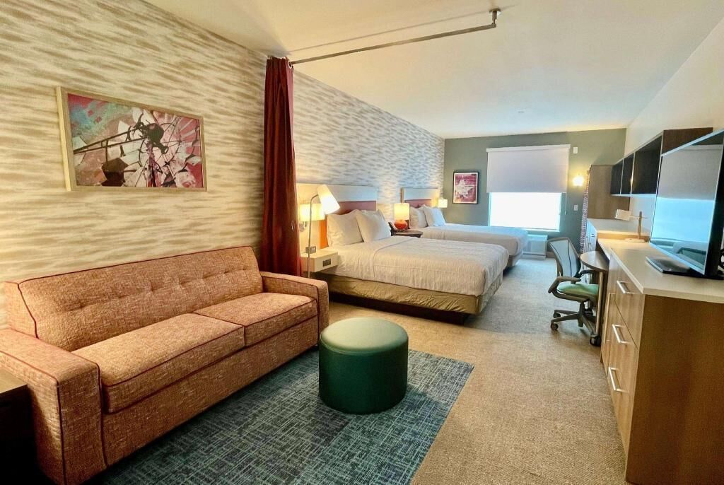 Premium bedding, Tempur-Pedic beds, desk, laptop workspace