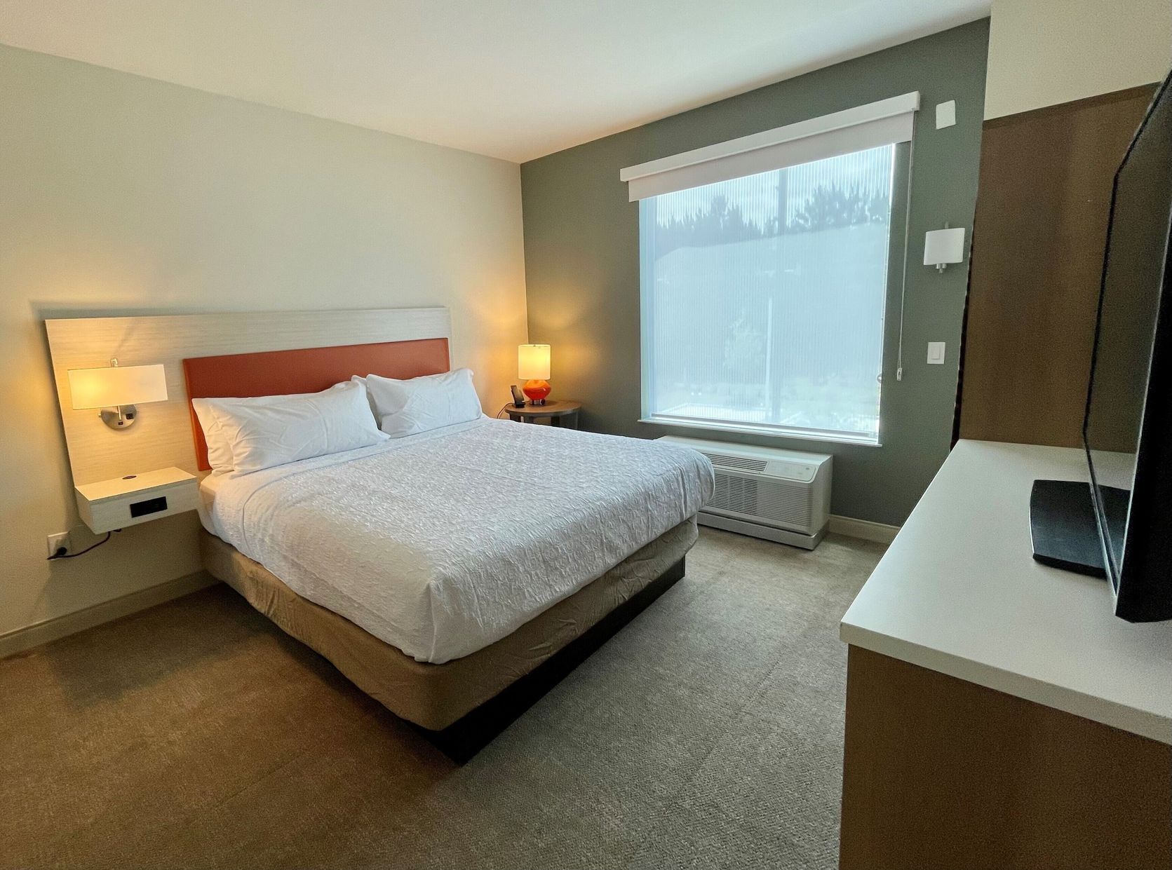 Premium bedding, Tempur-Pedic beds, desk, laptop workspace