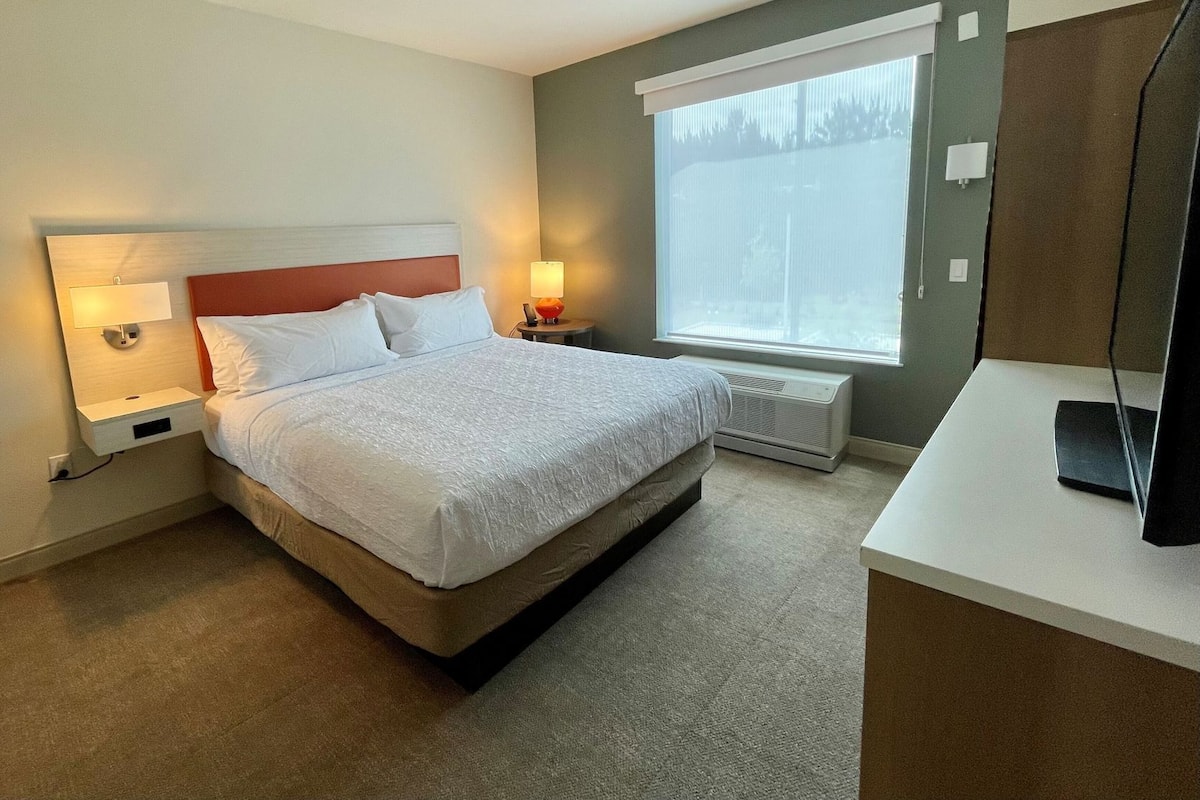 Premium bedding, Tempur-Pedic beds, desk, laptop workspace