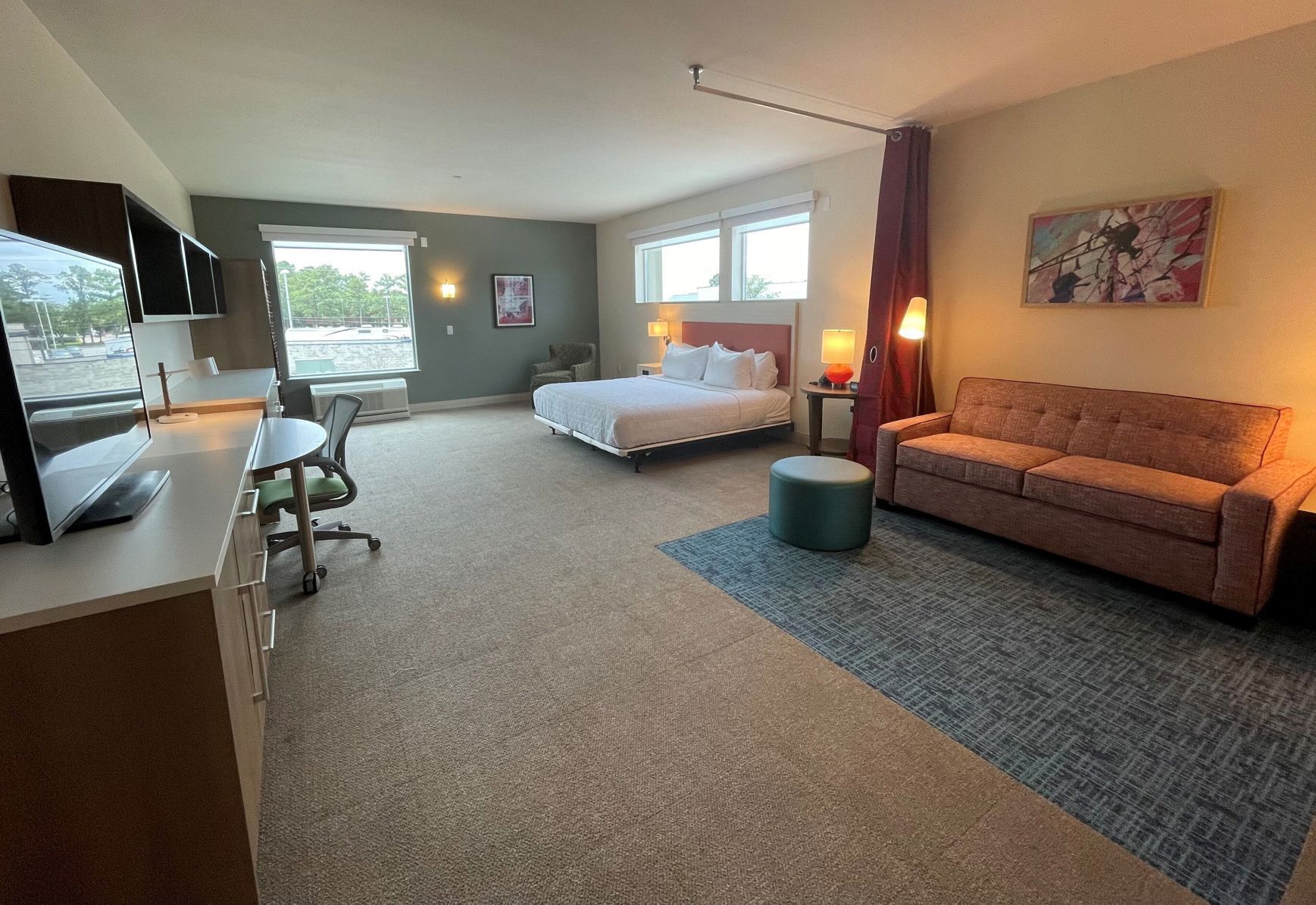 Premium bedding, Tempur-Pedic beds, desk, laptop workspace