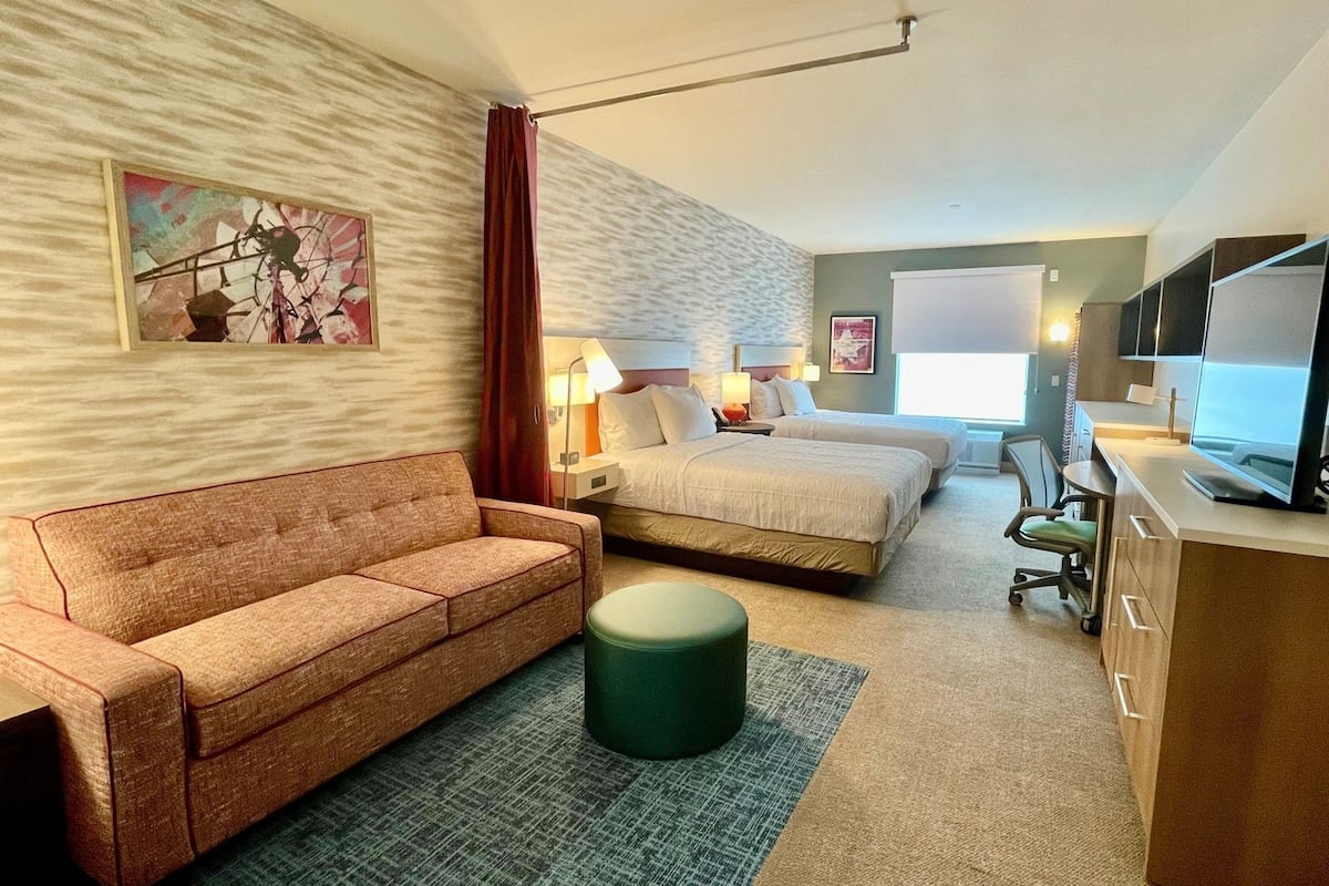 Premium bedding, Tempur-Pedic beds, desk, laptop workspace