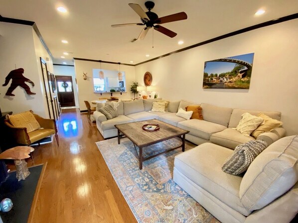 Smart TV, fireplace, books, printers