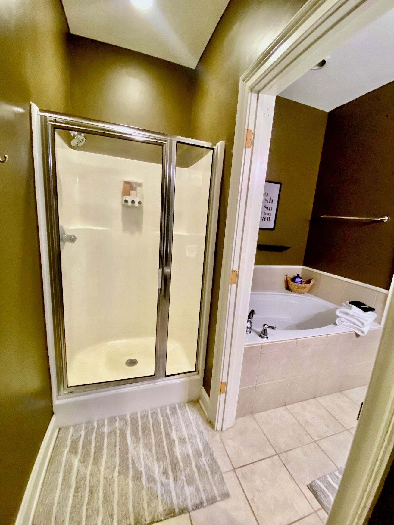 Combined shower/tub, hair dryer, towels, soap