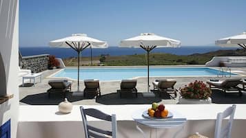 Seasonal outdoor pool, pool umbrellas