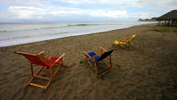 On the beach, free beach cabanas, sun-loungers, beach umbrellas