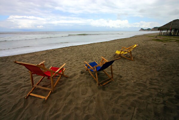 On the beach, free beach cabanas, sun-loungers, beach umbrellas