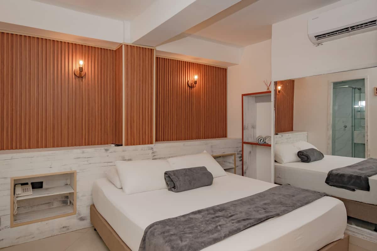 Quarto júnior | Cofres nos quartos, Wi-Fi de cortesia, roupa de cama