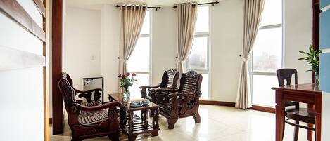Family Triple Room | Living area