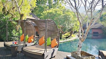 Outdoor pool, pool umbrellas, sun loungers