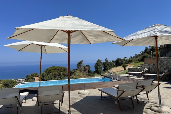 Seasonal outdoor pool, pool umbrellas