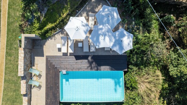 Seasonal outdoor pool, pool umbrellas