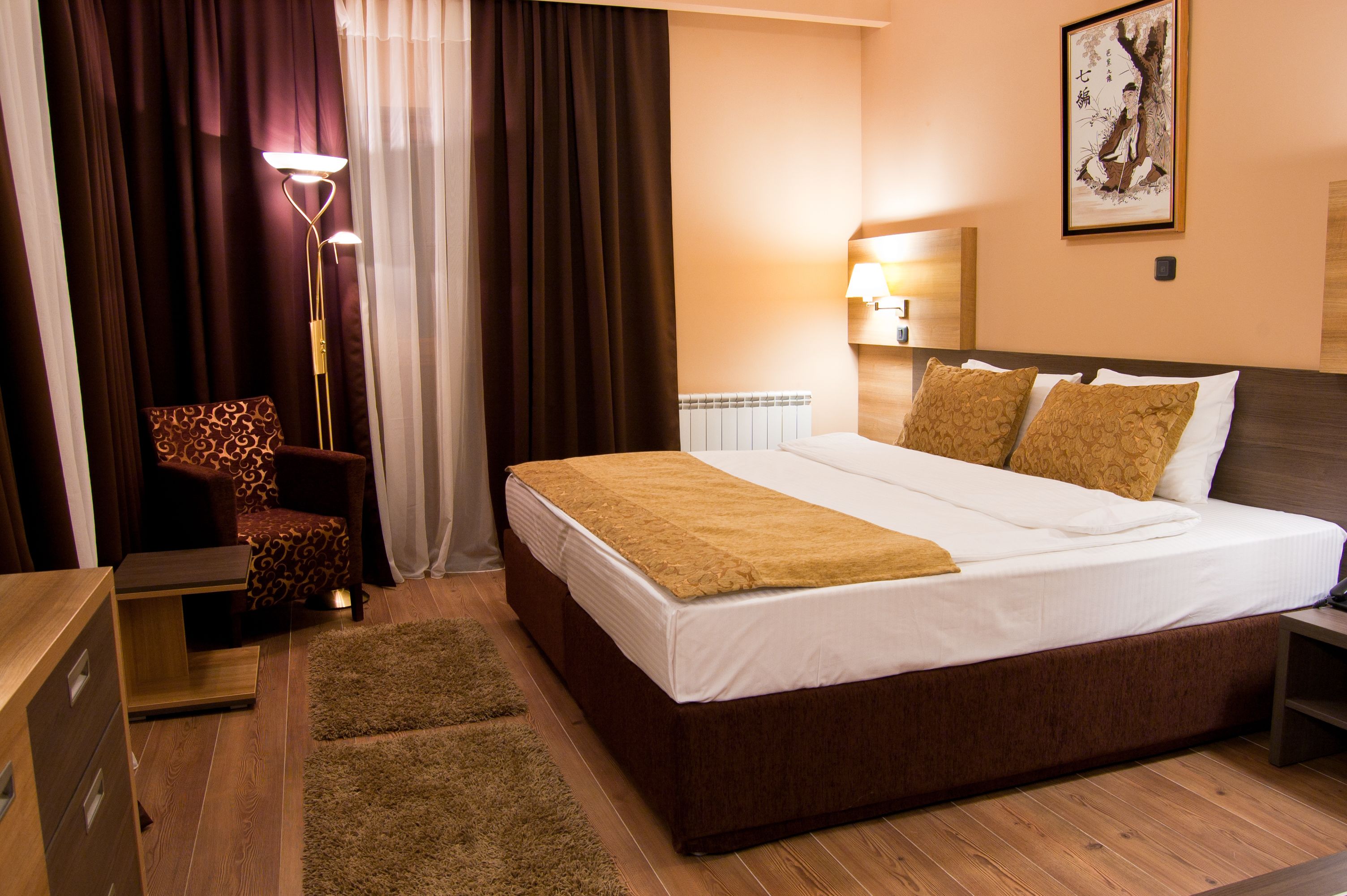 classic twin room, 1 bedroom, smoking, park view | minibar, in-room safe, desk, iron/ironing board