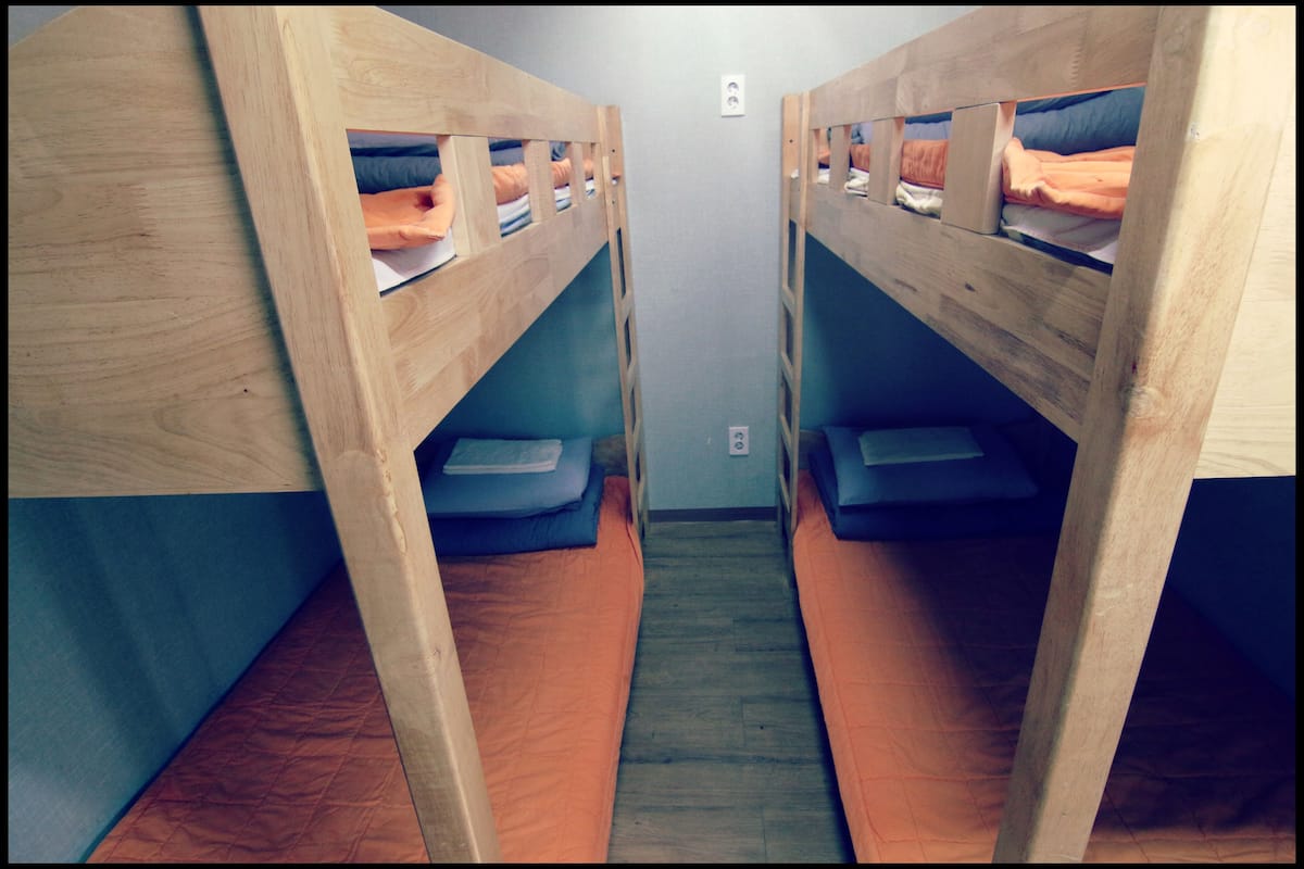 Economy Quadruple Room, Non Smoking, City View | Desk, free WiFi, bed sheets