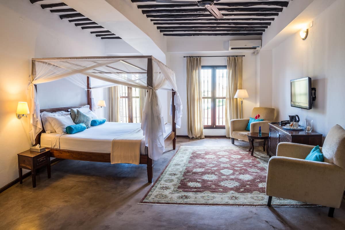 Junior Suite (Malkia) | Premium bedding, minibar, in-room safe, individually decorated