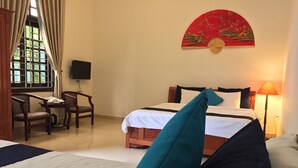 Suite | Living room | 32-inch LCD TV with cable channels, TV, DVD player - Hao Anh Homestay (Hoi An)