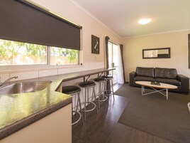 Deluxe Apartment, 1 Bedroom | In-room safe, iron/ironing board, cribs/infant beds, free WiFi