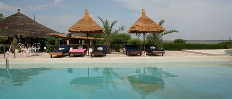 Outdoor pool, pool umbrellas, pool loungers