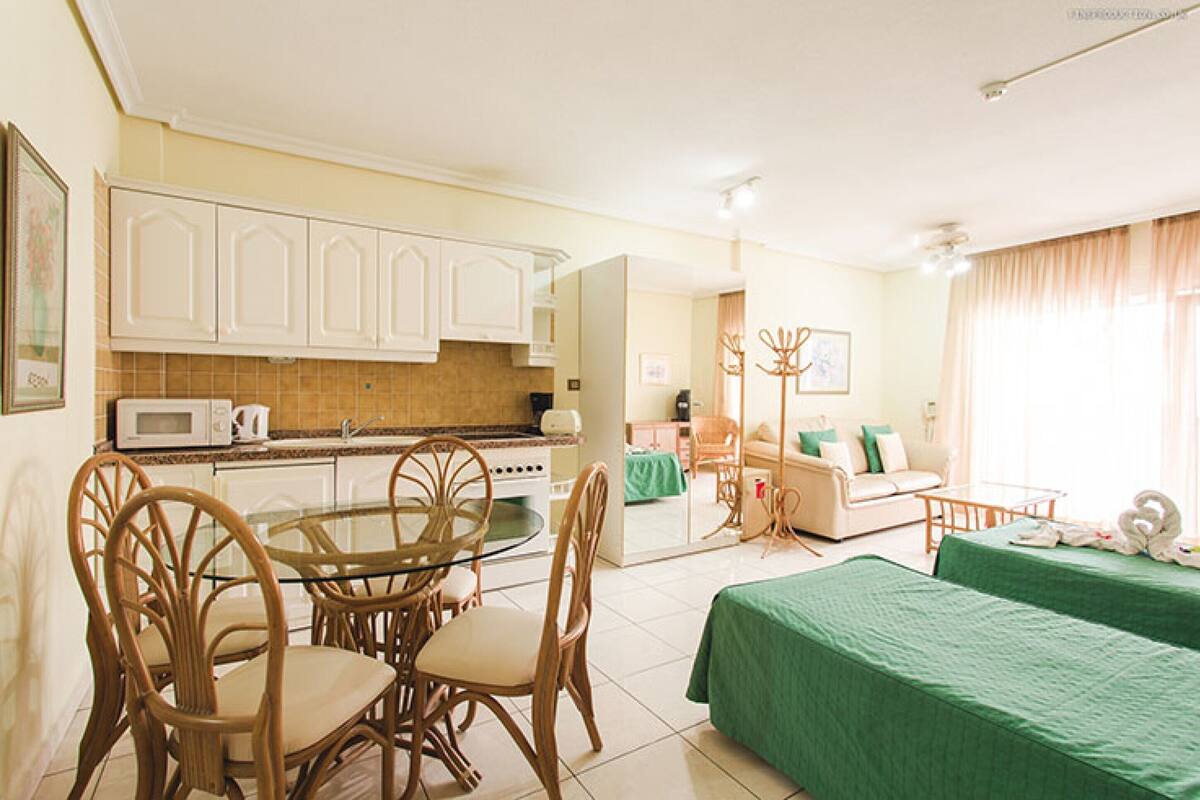 Studio | 1 bedroom, in-room safe, blackout drapes, iron/ironing board