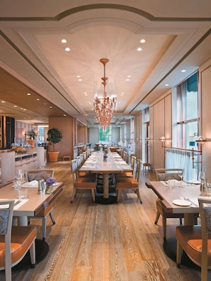 A spacious dining area with a long table set for a meal, surrounded by chairs. - Shangri-La Bosphorus, Istanbul (Istanbul)