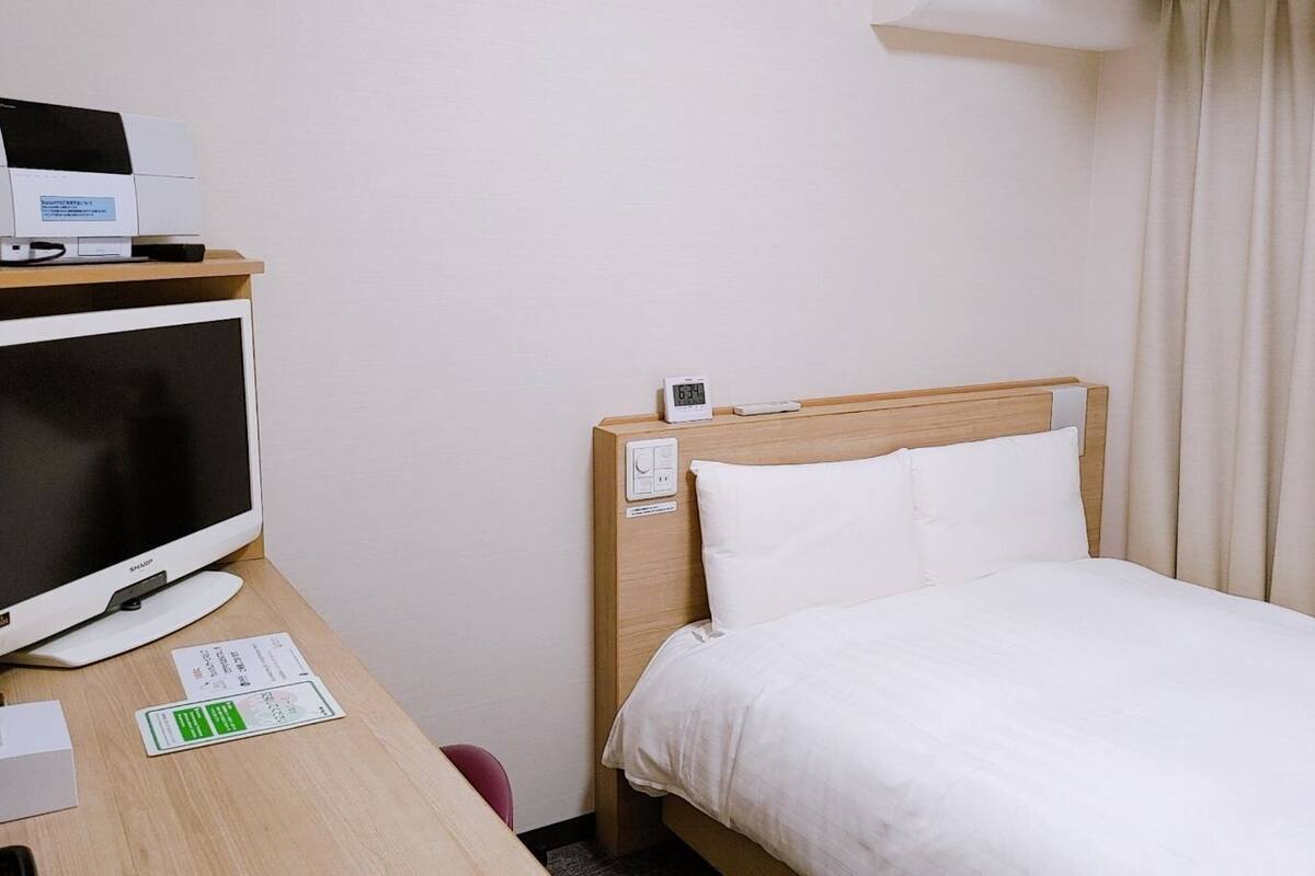 Down comforters, desk, blackout drapes, soundproofing