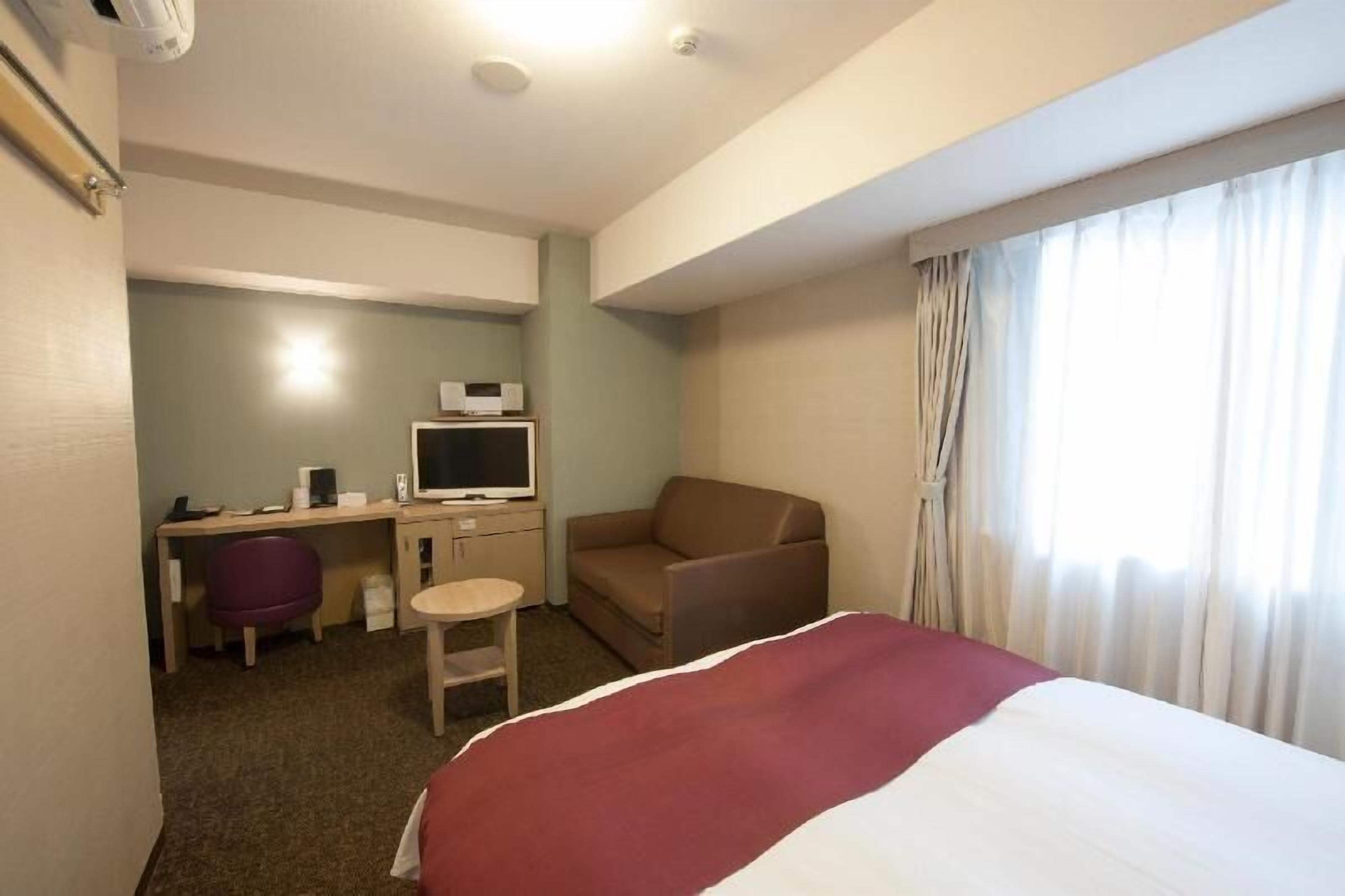 Down comforters, desk, blackout drapes, soundproofing