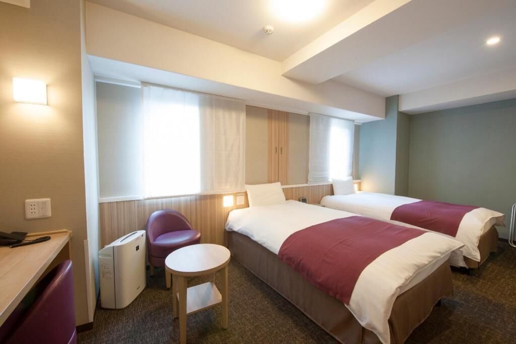 Down comforters, desk, blackout drapes, soundproofing