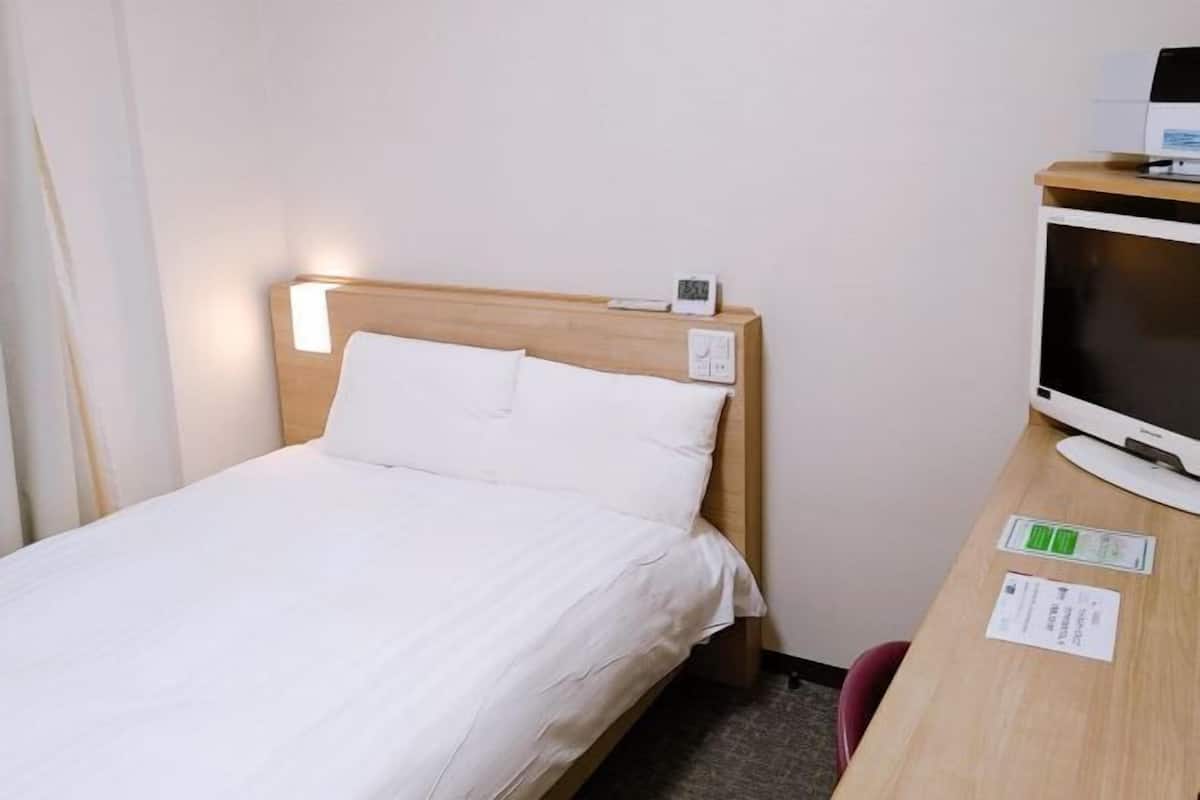 Down comforters, desk, blackout drapes, soundproofing