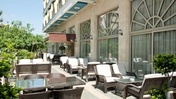 Breakfast, lunch served; international cuisine, al fresco dining