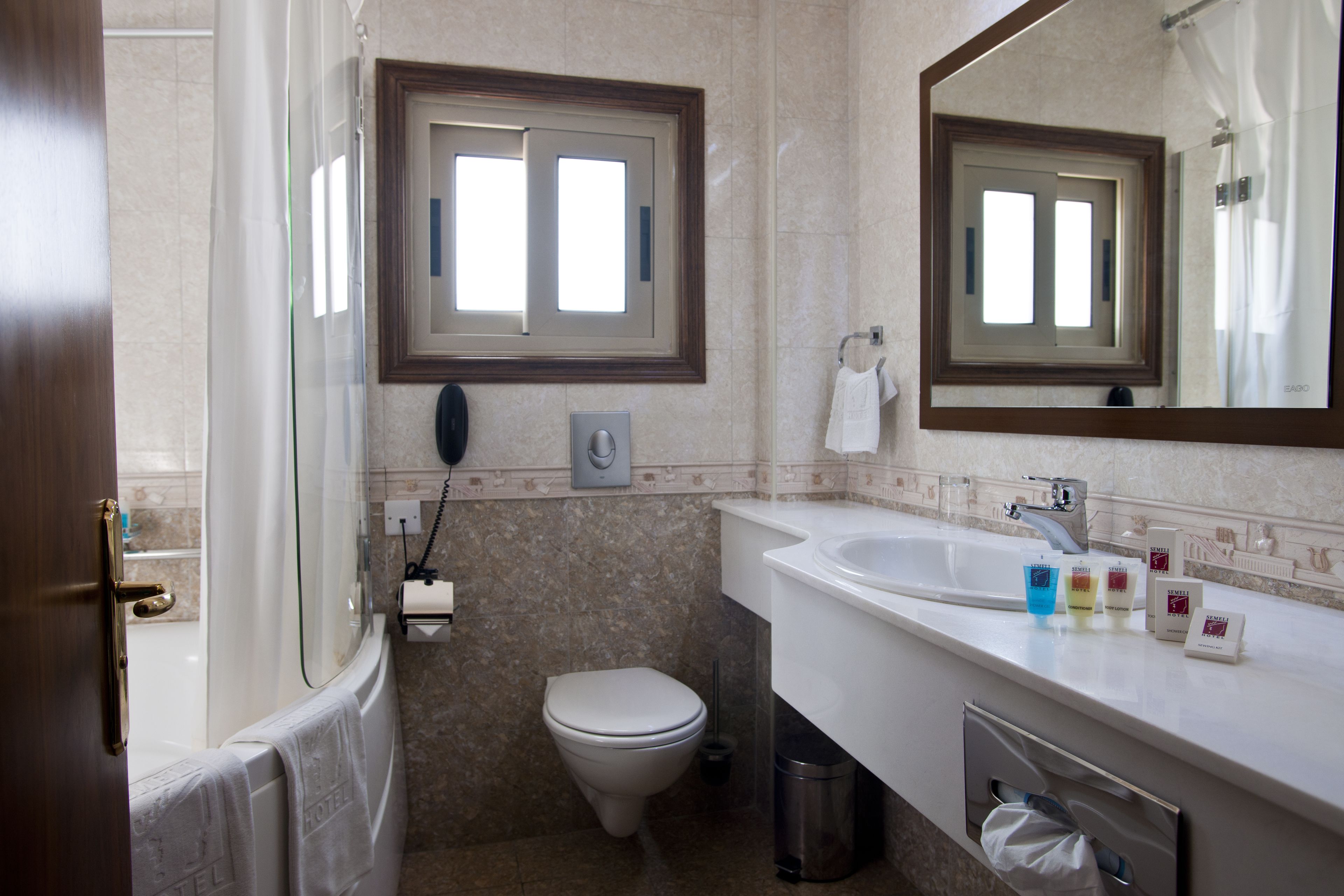 executive suite | bathroom | rainfall showerhead, free toiletries, hair dryer, bathrobes