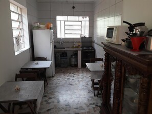 Fridge, microwave, stovetop, cookware/dishes/utensils
