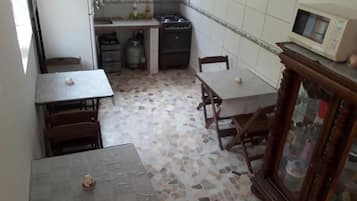 Fridge, microwave, stovetop, cookware/dishes/utensils