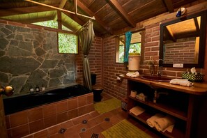Family Bungalow, 2 Bedrooms | Bathroom | Combined shower/tub, deep soaking tub, free toiletries, hair dryer