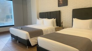 Classic Triple Room | Down comforters, memory foam beds, soundproofing, free WiFi
