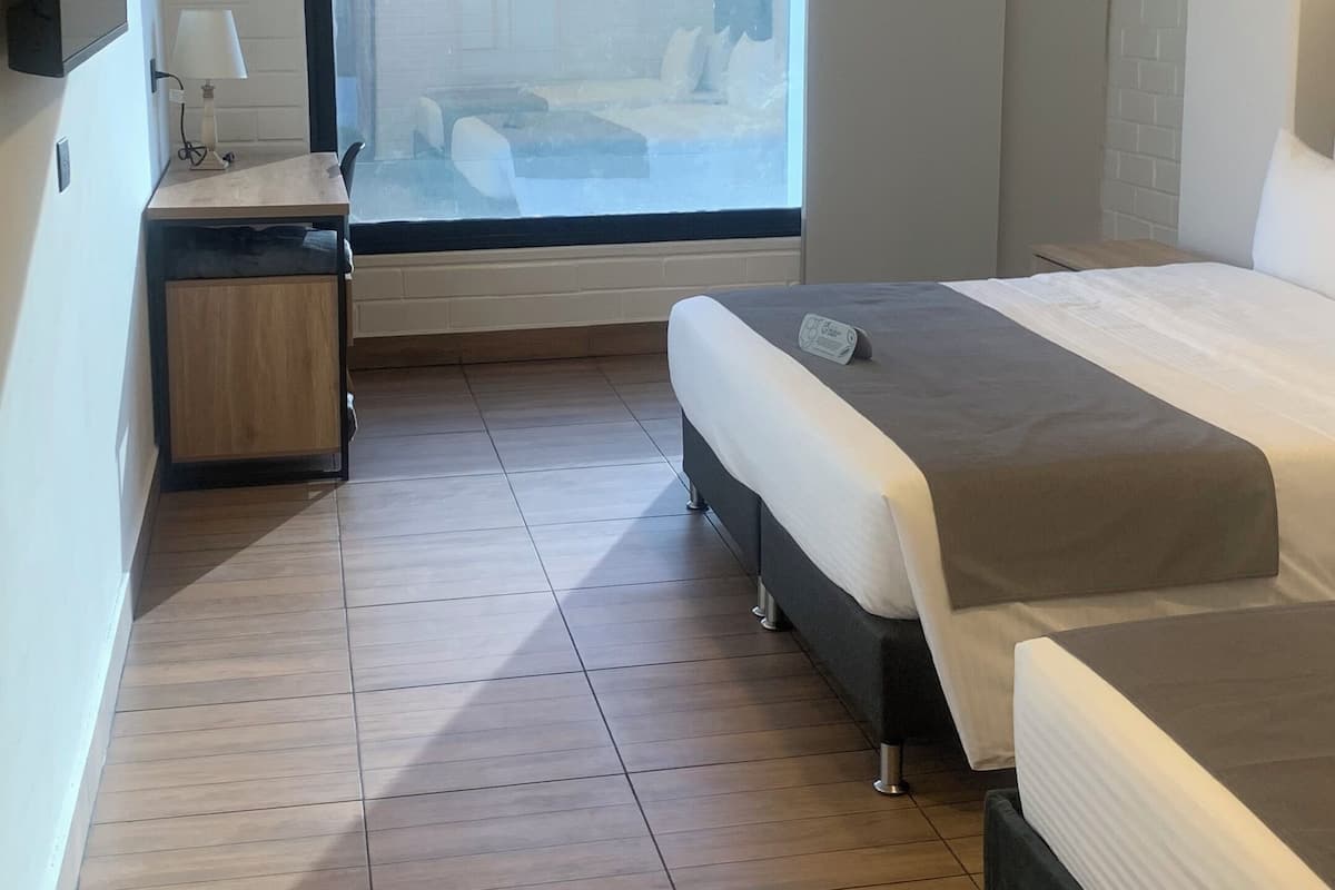 Klassieke driepersoonskamer | 1 slaapkamer, bedden met traagschuimmatras, geluiddichte muren