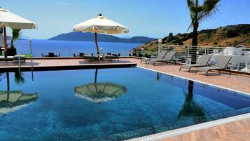 Seasonal outdoor pool, pool umbrellas, sun loungers