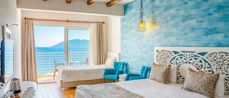 Standard Triple Room, Sea View | Pillowtop beds, minibar, in-room safe, desk