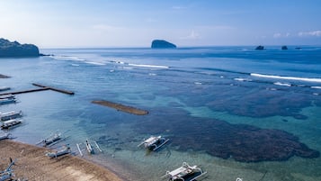 Private beach, white sand, sun loungers, beach umbrellas
