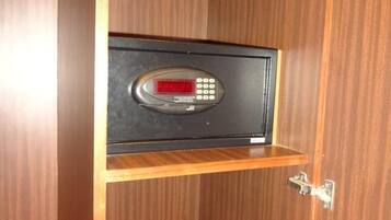 A wooden cabinet with a digital lock.