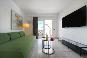 Apartment, 1 Bedroom | Living room | 32-inch plasma TV with digital channels, TV