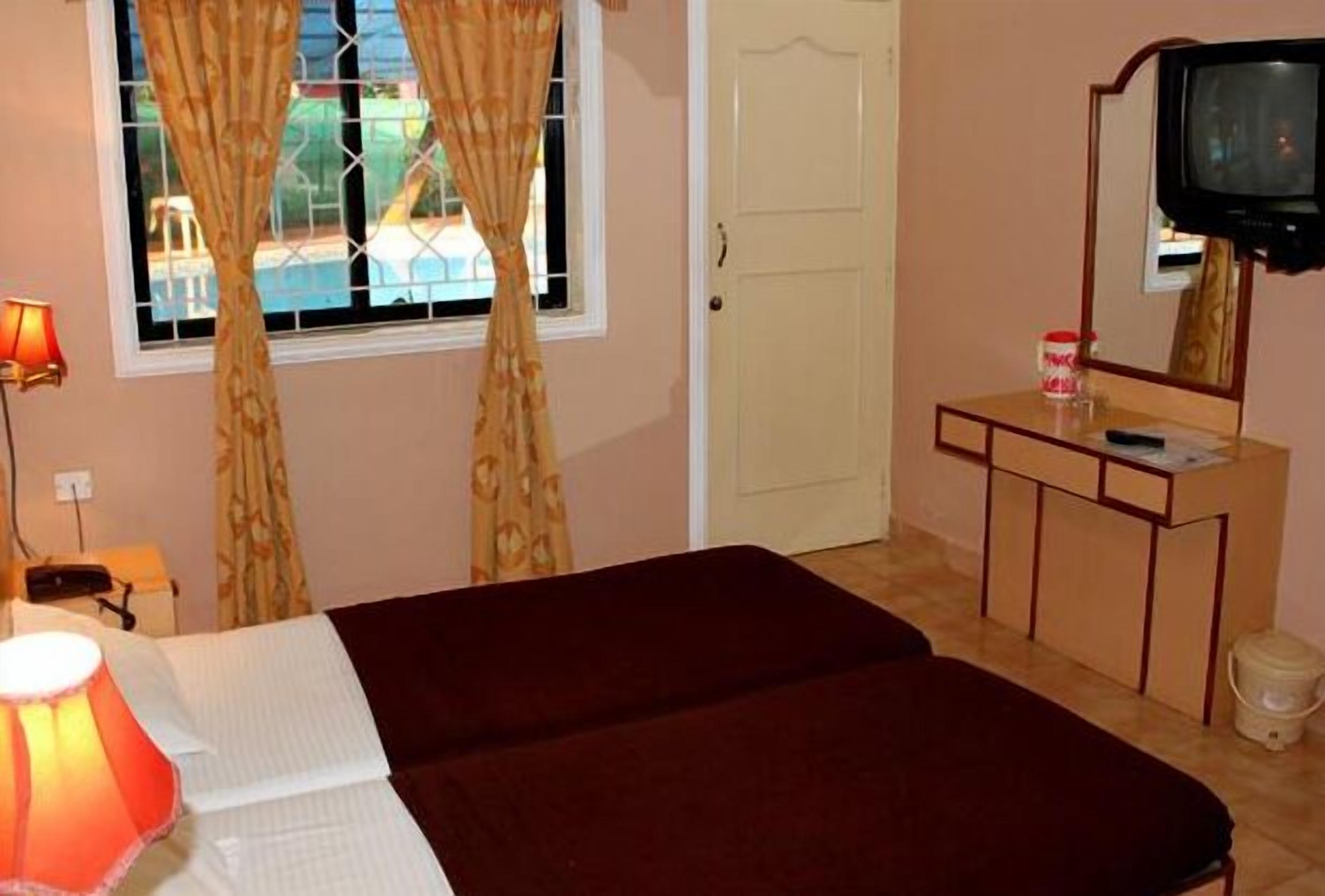 standard room (no ac) | in-room safe, desk, iron/ironing board