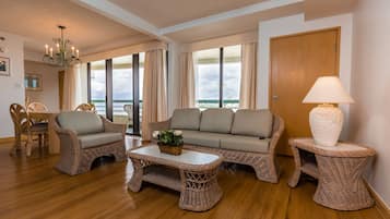 Deluxe Suite, 2 Bedrooms, Kitchen, Partial Ocean View | 1 bedroom, blackout drapes, iron/ironing board, free WiFi