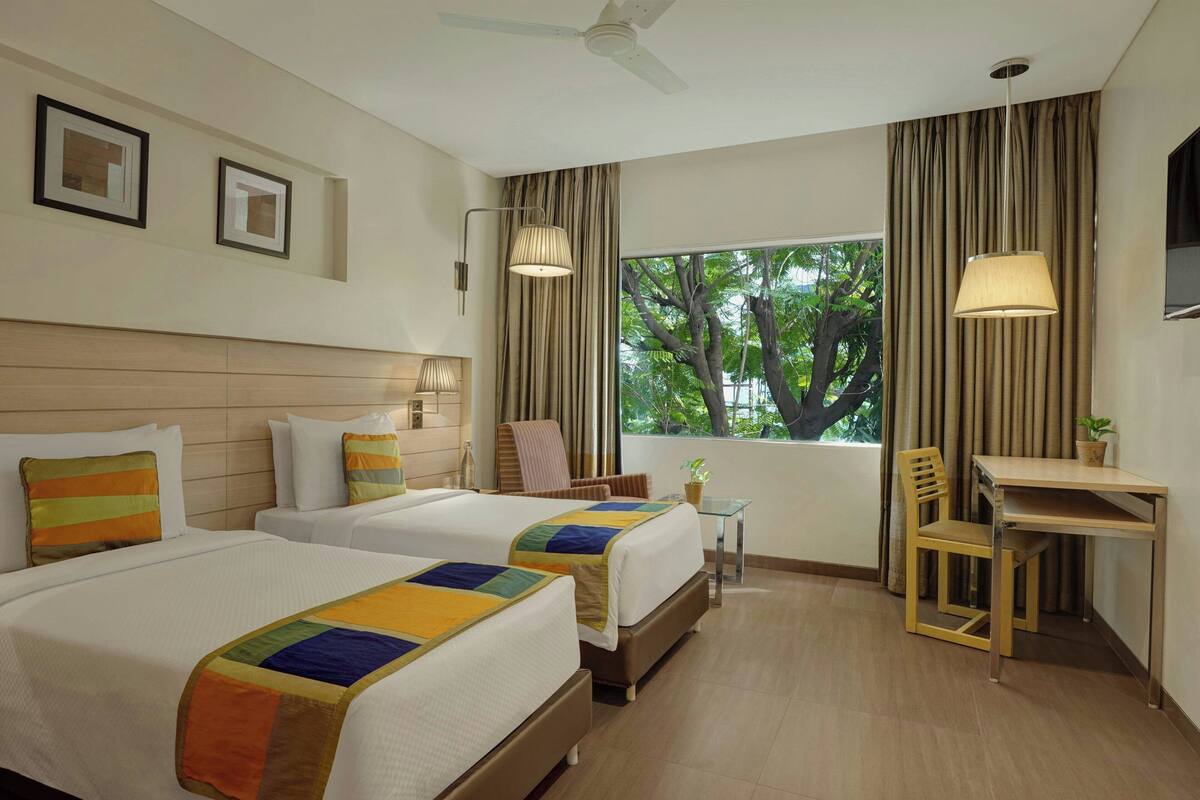 Classic Room, 2 Twin Beds, City View | Minibar (some free items), in-room safe, desk, blackout drapes