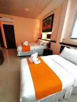 Family Room, 1 Bedroom, Private Bathroom, City View | Down comforters, individually decorated, desk, free WiFi