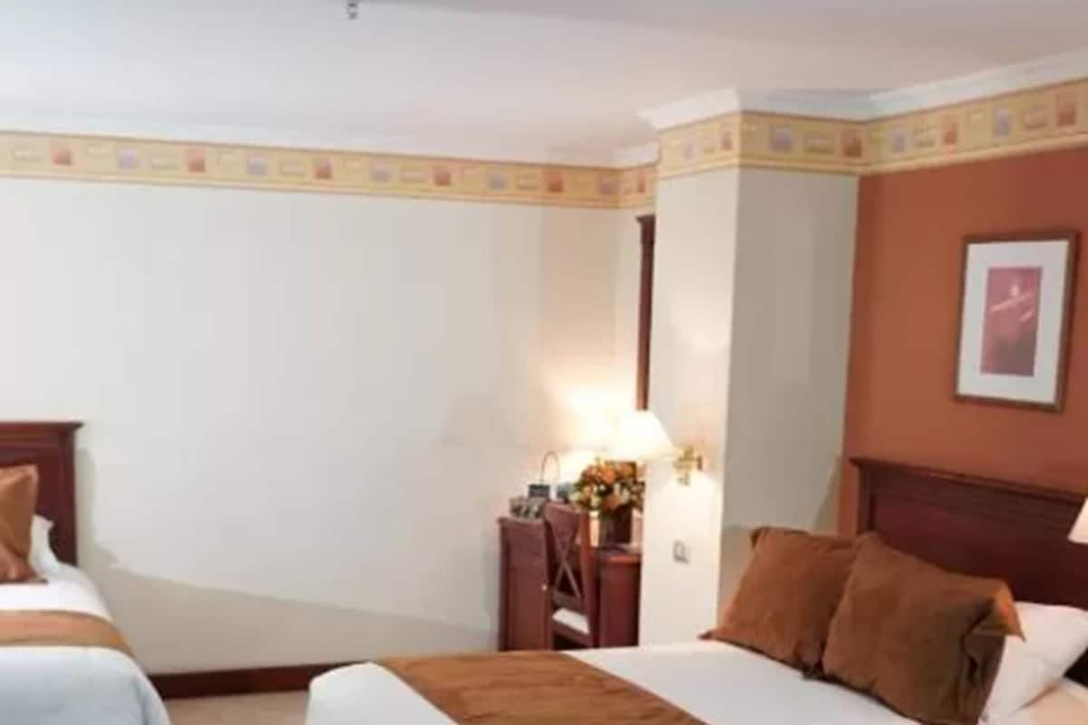 Superior Triple Room | 1 bedroom, minibar, in-room safe, individually furnished