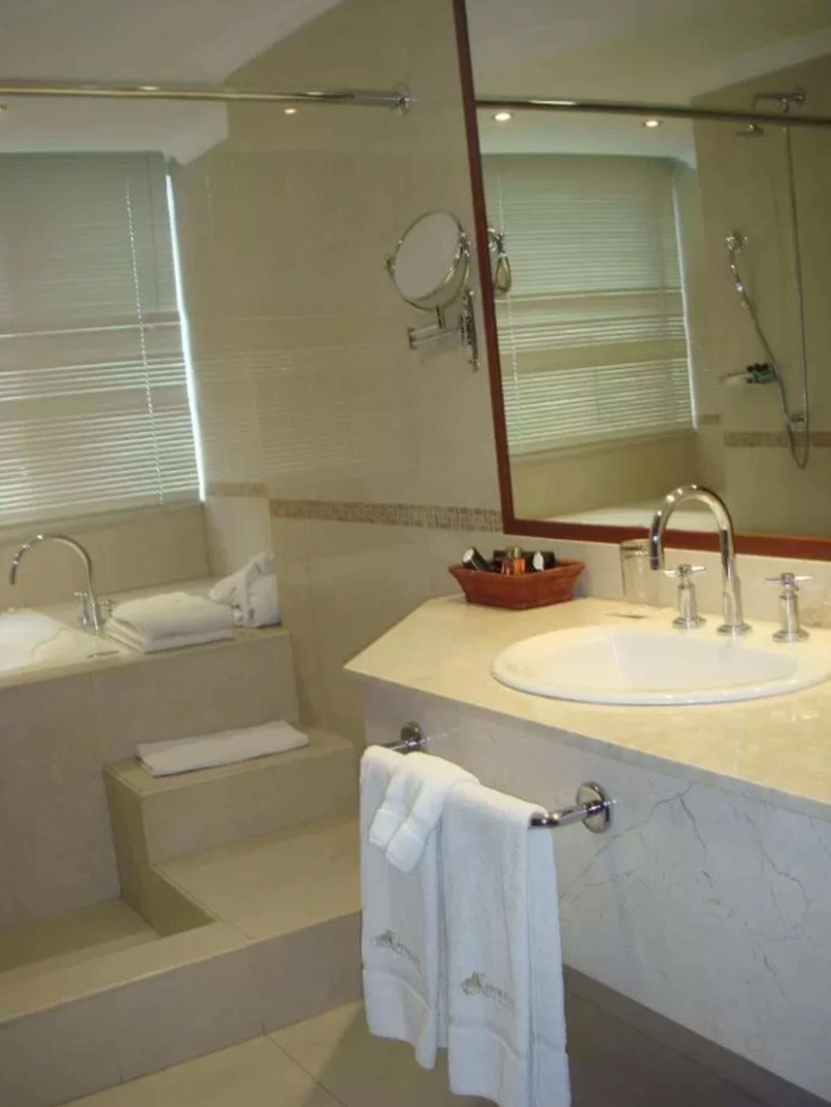 combined shower/bathtub, free toiletries, hair dryer, towels