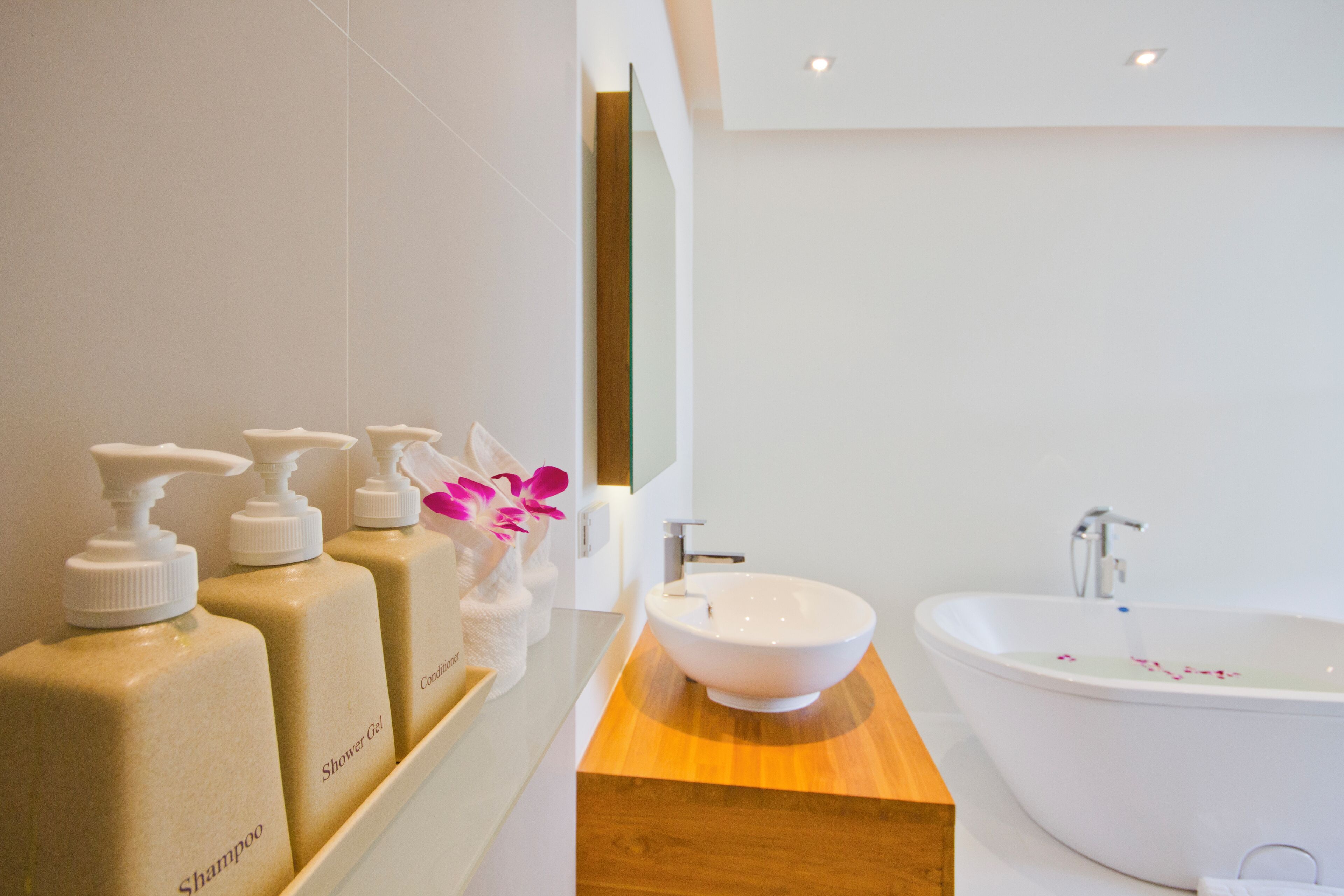 two bedroom penthouse suite | bathroom | free toiletries, hair dryer, bathrobes, slippers