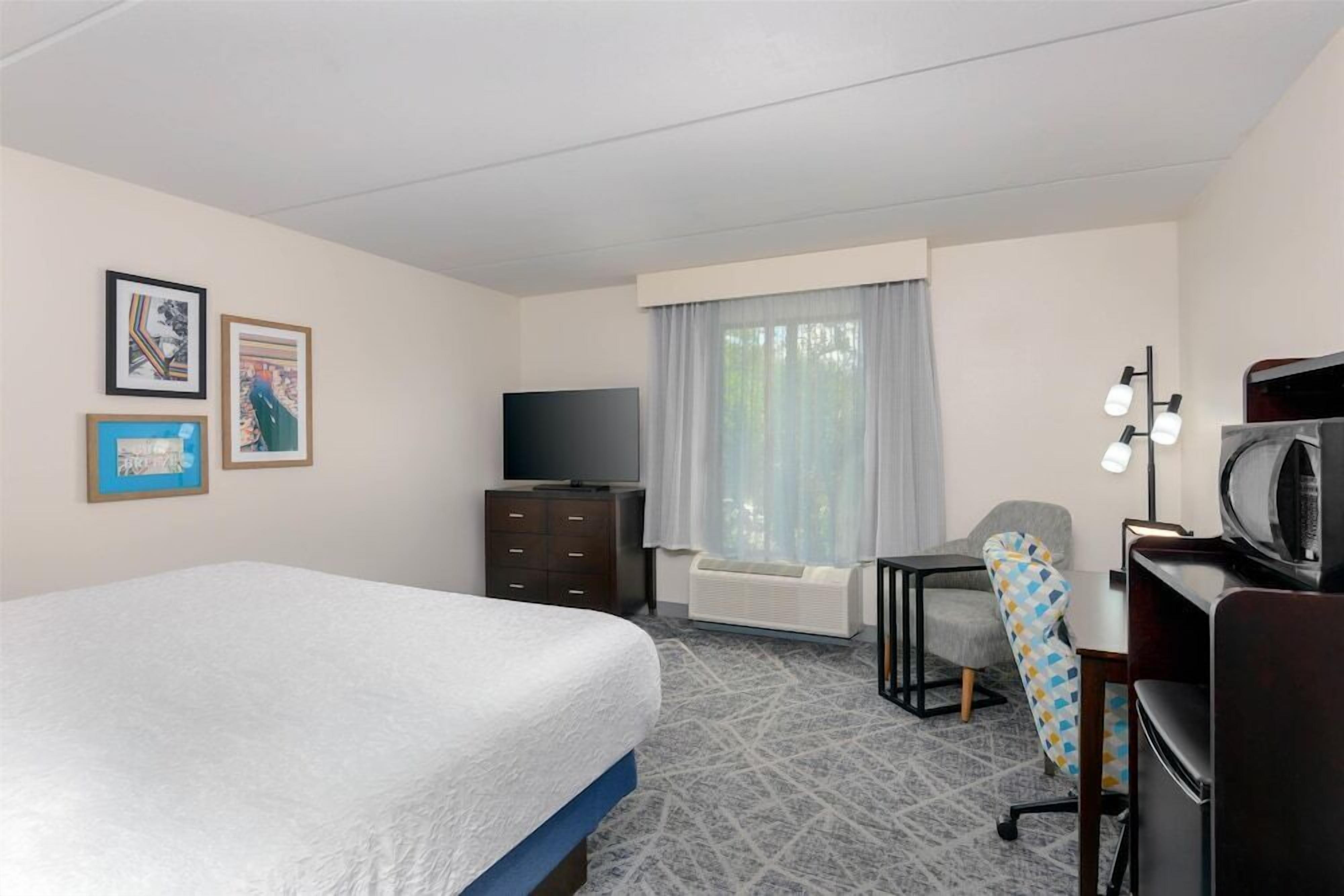 Desk, laptop workspace, blackout curtains, iron/ironing board