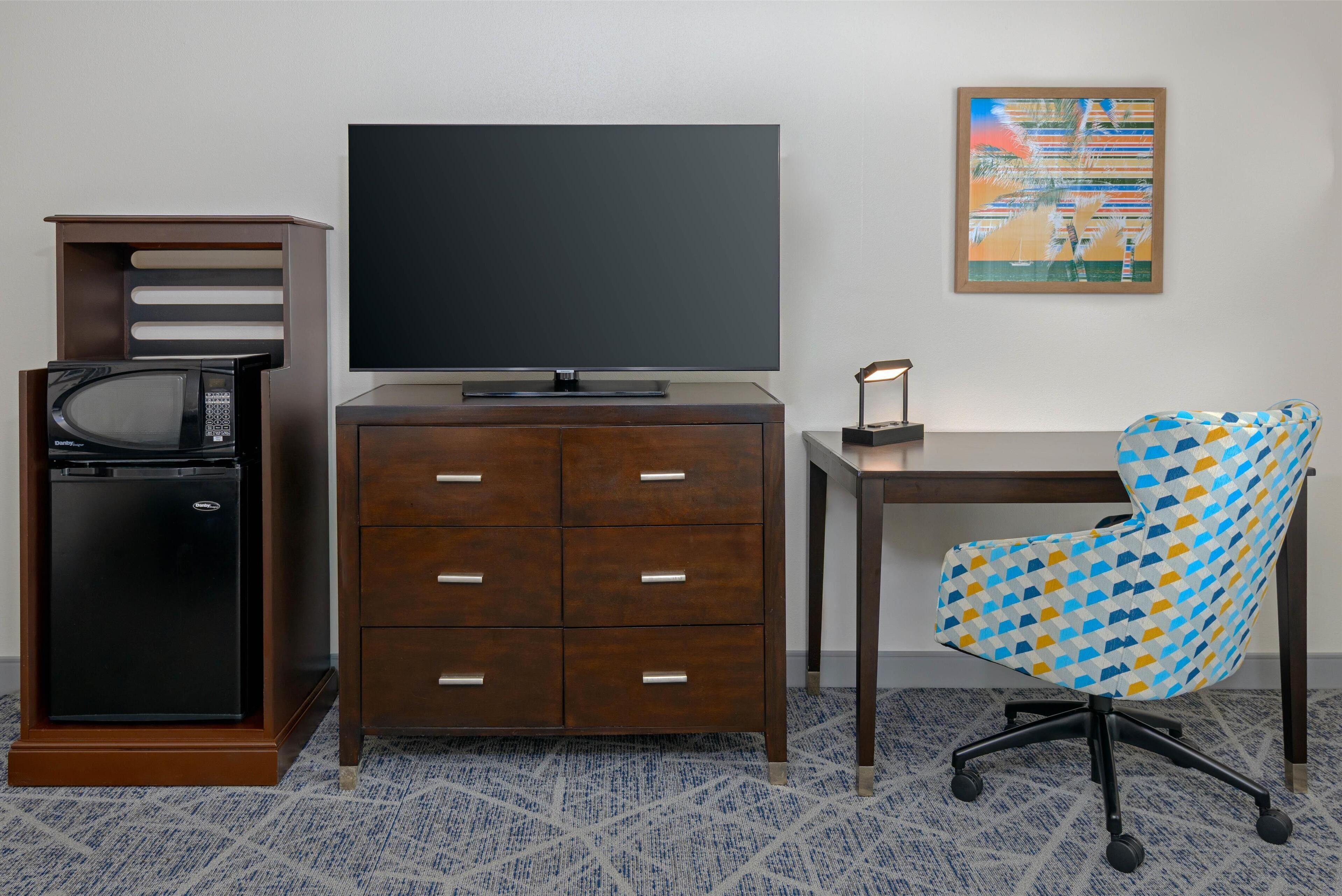 desk, laptop workspace, blackout curtains, iron/ironing board