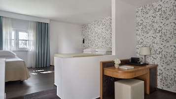 Open Plan Family Cottage | Minibar, in-room safe, individually decorated, desk